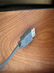Room 303: HDMI cable on the table