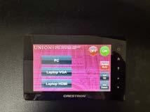 Use it: pick your source on the Crestron touch panel