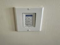 Room 307: Da-Lite motorized screen wall switch